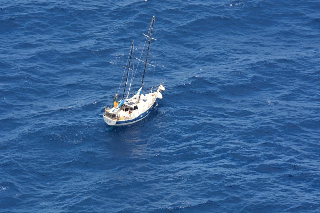 Aerial shot of stricken yacht Mahi with its skipper  taken by Te Kaha  © New Zealand Defence Force